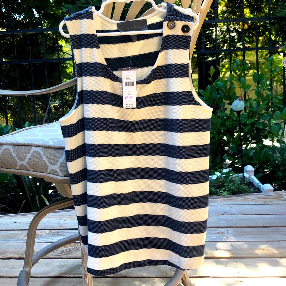 Striped sleeveless navy top.